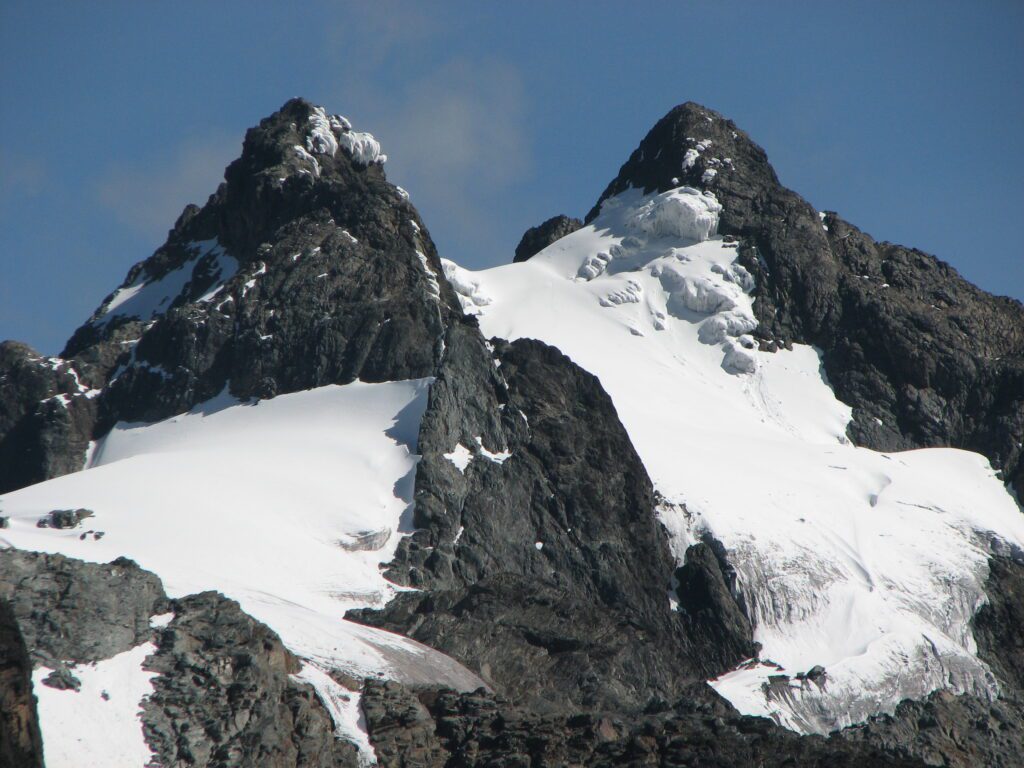 one of the snow capped peaks of the rwenzori mountain in western uganda along the borde 1